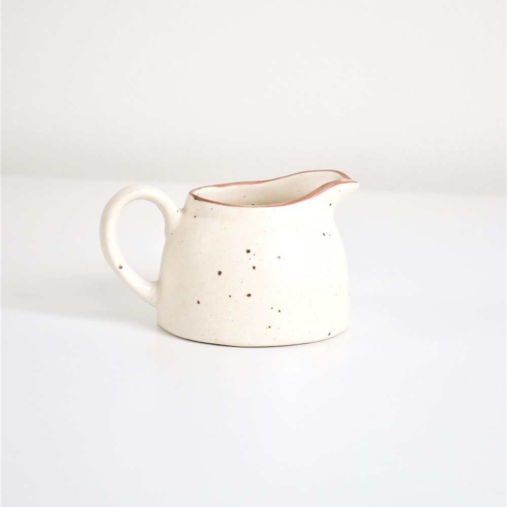 https://www.buknola.com/i/Speckled-Stoneware-creamer-Cream-Buk-Nola-31435.jpg?size=700